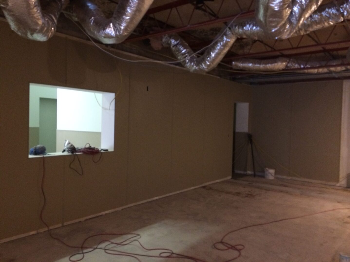 A green megaphone is on the black background