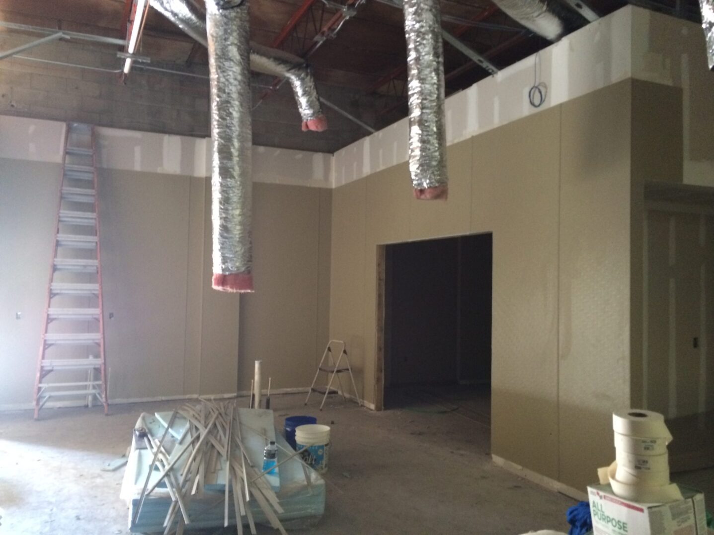 A green megaphone is on the black background