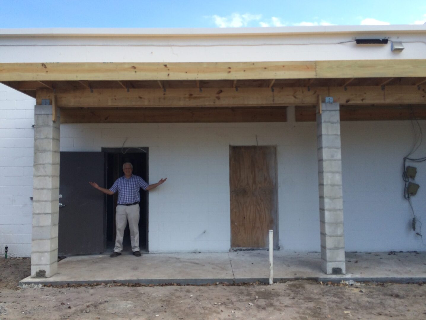 A green megaphone is on the black background