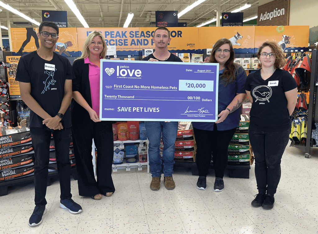 A green megaphone is on the black background