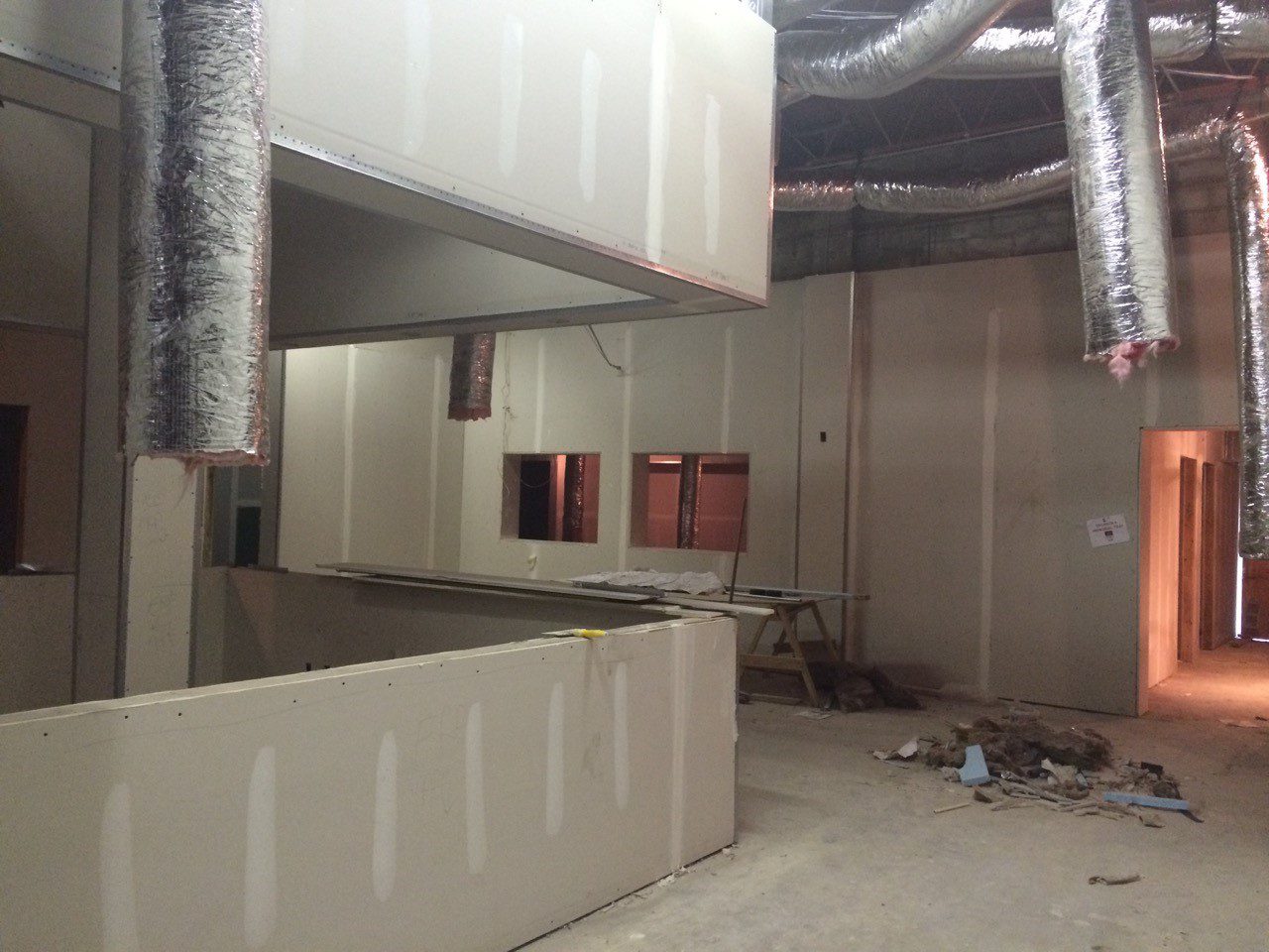 A green megaphone is on the black background